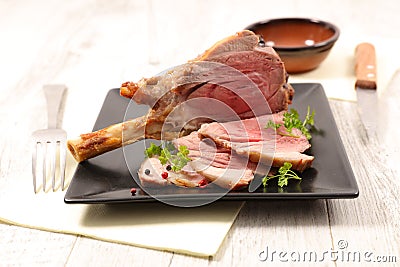 Baked lamb chop and slices Stock Photo