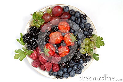 Plate with berries Stock Photo