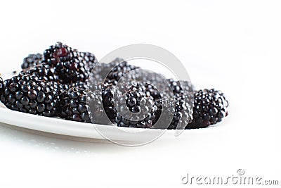 Plate with blackberries Stock Photo