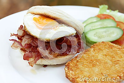 plate with boiled rice egg and sausage, fry shrimp, bacon vegetables Stock Photo