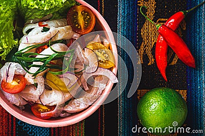 Plate of ceviche on a colorful tablecloth Stock Photo