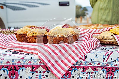 Plate of cheese muffins on table Stock Photo