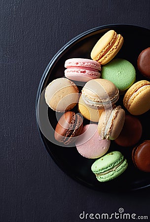 Plate of colorful macarons Stock Photo