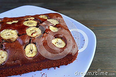 Plate of Delectable Fresh Baked Wholemeal Chocolate Banana Cake Stock Photo