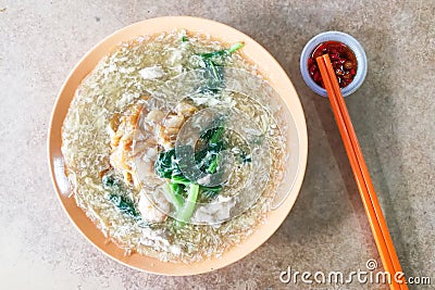 Plate of delicious fried kuey teow noodle Chinese Cantonese style Stock Photo