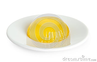 Plate with delicious yellow fruit jelly isolated Stock Photo