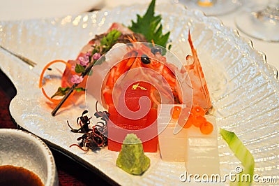 A dish of fish, squid, and shrimp sashimi Stock Photo