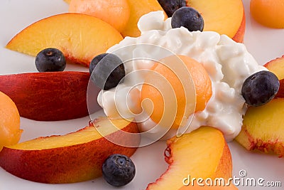 Plate of fruit and cottage cheese Stock Photo