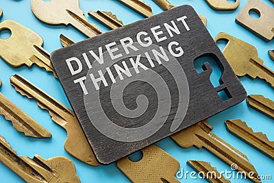 Plate with inscription on the metal keys. Divergent thinking concept. Stock Photo