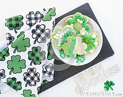 Plate of Irish Goodies with Shamrock Towel on White Stock Photo