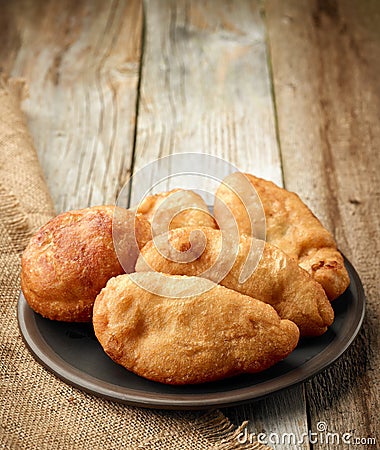 Plate of meat pies belyashi Stock Photo