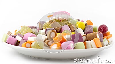 Plate of mixed sweets with teeth Stock Photo