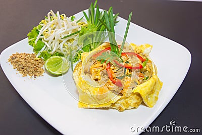 Plate of Pad Thai or phat Thai in omelette Stock Photo