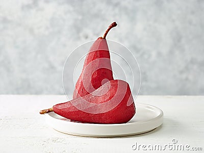 Pears poached in red wine Stock Photo