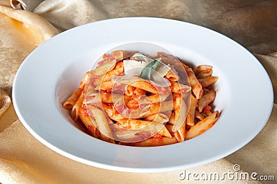 Plate of penne pasta Stock Photo