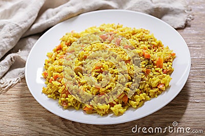 plate of pilaf with meat and vegetables Stock Photo