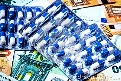 Plate with pills on the background of euro bills. The concept of the expensive cost of healthcare Stock Photo