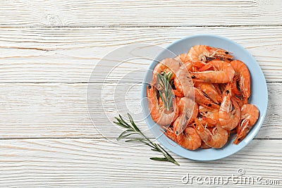 Plate with shrimps on background, top view Stock Photo