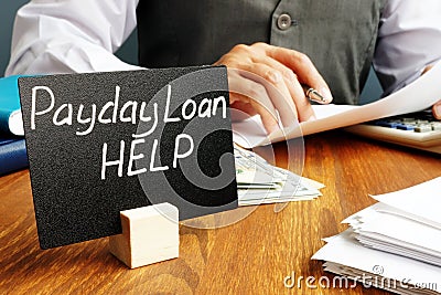 Plate with sign Payday loan help. Stock Photo