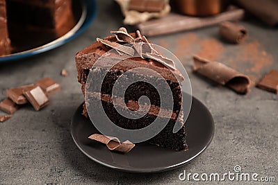 Plate with slice of tasty homemade chocolate cake Stock Photo