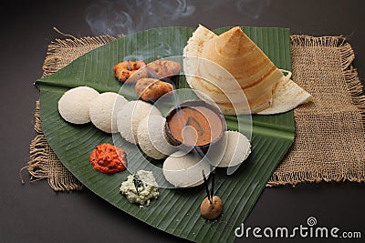 Plate of south indian food idli sambar dosa wada chutney, Stock Photo