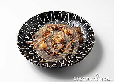 plate of soya noodles with prawns centred , isolated on white background Stock Photo