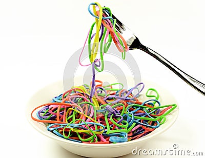 Plate of spaghetti made of rubber bands Stock Photo