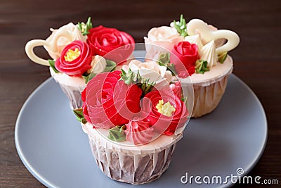 Plate of stunning flower bouquet shaped frosting cupcakes Stock Photo