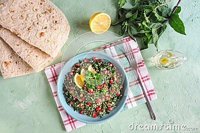 A plate of tabbouleh salad. Traditional Arabic food. Stock Photo