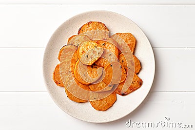 Plate with tasty cooked sweet potato Stock Photo