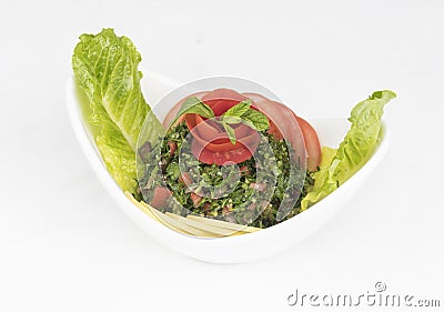 Plate of traditional Arabic salad tabbouleh Stock Photo