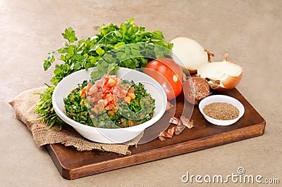 Plate of traditional Arabic salad tabbouleh Stock Photo