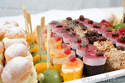 Plate with various types of dessert on a white background Stock Photo