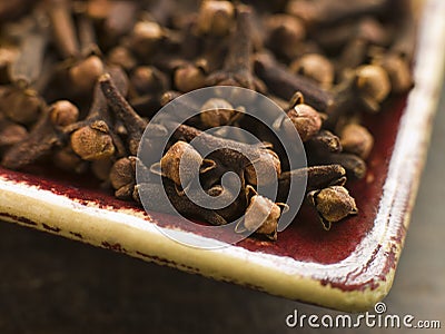 Plate of Whole Cloves Stock Photo