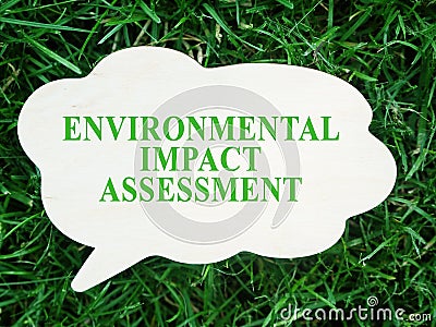 Plate with words Environmental impact assessment EIA. Stock Photo