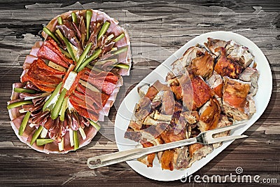 Plateful Of Spit Roasted Pork Shoulder Slices And Serbian Appetizer Savory Dish Set On Old Cracked Rustic Garden Table Stock Photo