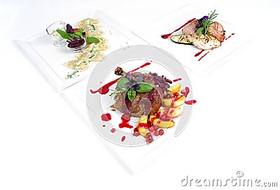 Plates of fine dining meal Stock Photo