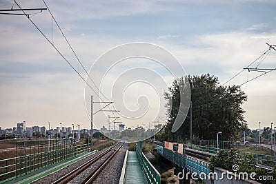 Platform and bridge in a modern train station on a suburban electrified line of the commuter railway network of Belgrade, Serbia. Stock Photo