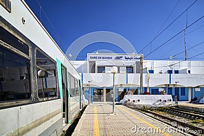 The platform of the Sahel Metro in Mahdia with the train waiting for passengers to Sousse Editorial Stock Photo