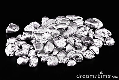 platinum nuggets isolated. Precious metal known as another white luxury concept Stock Photo