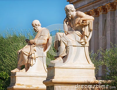 Plato and Socrates marble statues outside of the national academy of Athens. Stock Photo