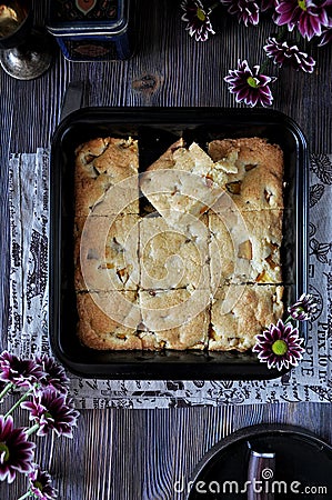 On a platter, Blondie with nectarine and chocolate in pieces Stock Photo