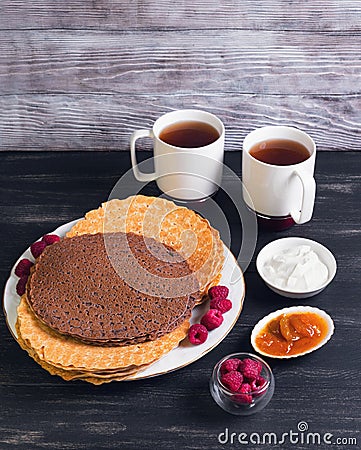 Platter with chocolate pancakes Stock Photo