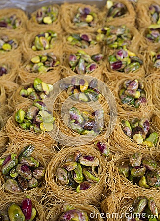 Platter crammed with Nightingales Nests or Ouch El Boulboul Stock Photo