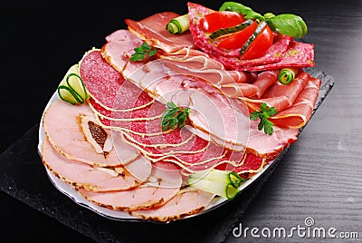 Platter of sliced ham,salami and cured meat Stock Photo