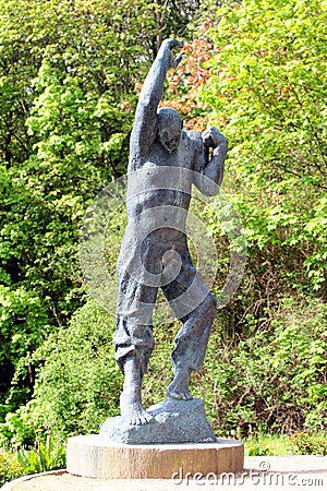 Plauen, Germany - May 14, 2023: Sculpture of Ascending Man by the German sculptor Fritz Cremer, located on Baerenstein hill near Editorial Stock Photo