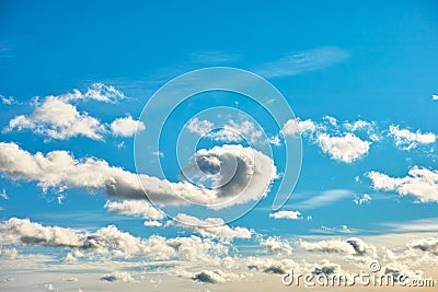 Play of clouds in blue sky Stock Photo