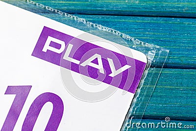 PLAY company telecommunication service provider logo symbol, detail, macro extreme closeup, mobile phone top up card object Editorial Stock Photo