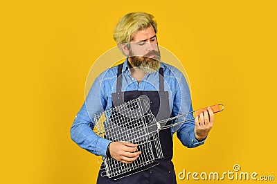 Play guitar. prepare dinner for family. use cooking utensils and various products. mature chef use cooking utensils for Stock Photo