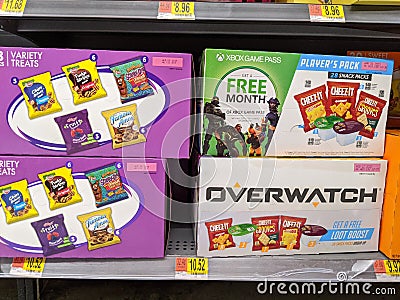 Player's Pack of Cheez-it wih Free month of Xbox Game Pass and Overwatch Loot Boost and Cookie Variety Treats on shelf Editorial Stock Photo